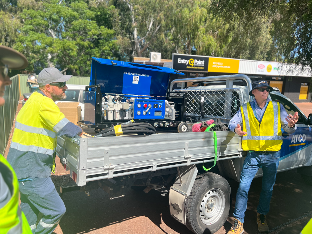 ATCO crew with a ZEVAC emissions reduction unit.